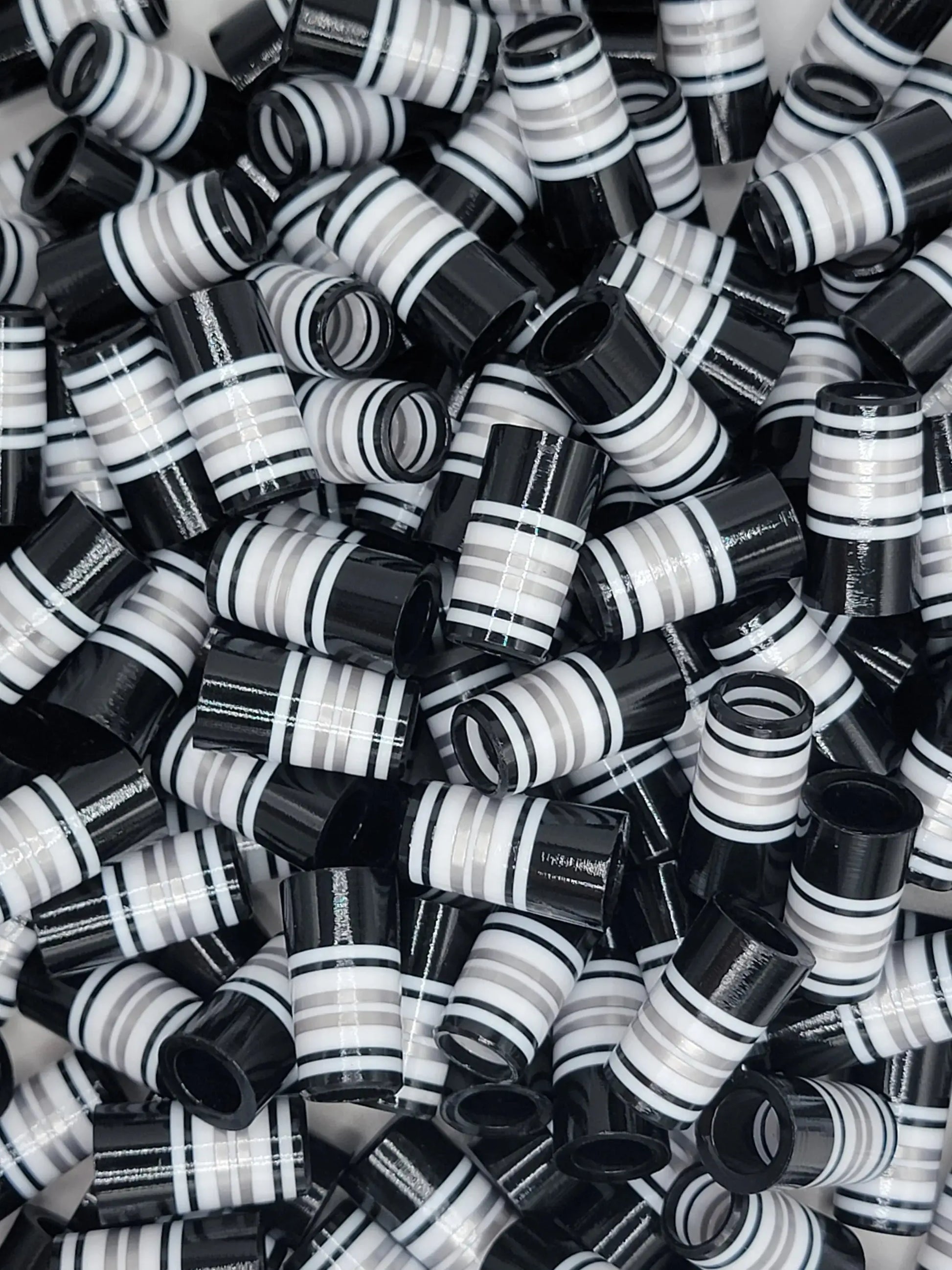 Hooch golf ferrules in black and white striped design, ideal for customizing golf clubs. BBF style ferrules for outdoor golf equipment upgrades.