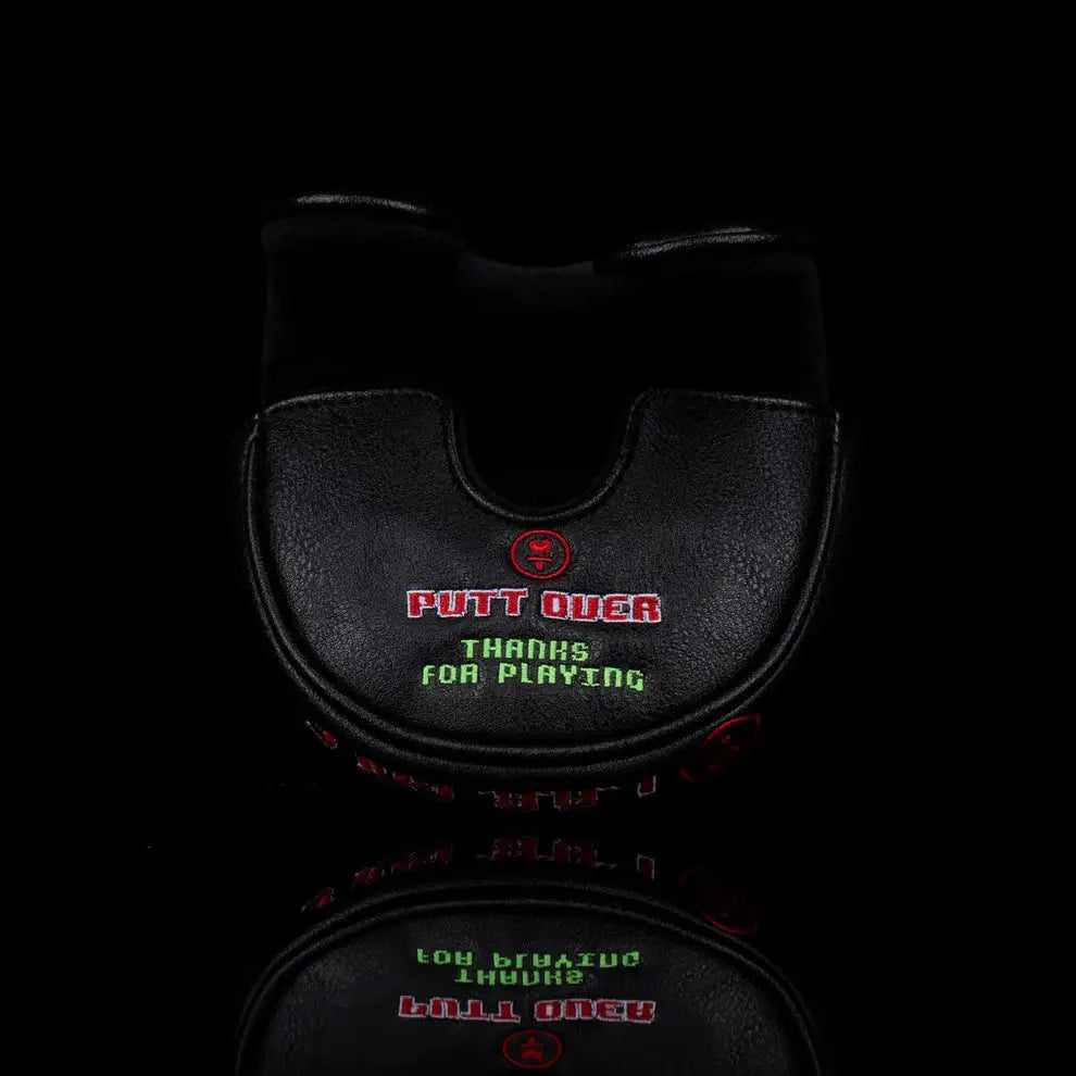 Back view of LAB Golf Player One Headcover with 'Putt Over' and 'Thanks for Playing' embroidered in arcade-style font.