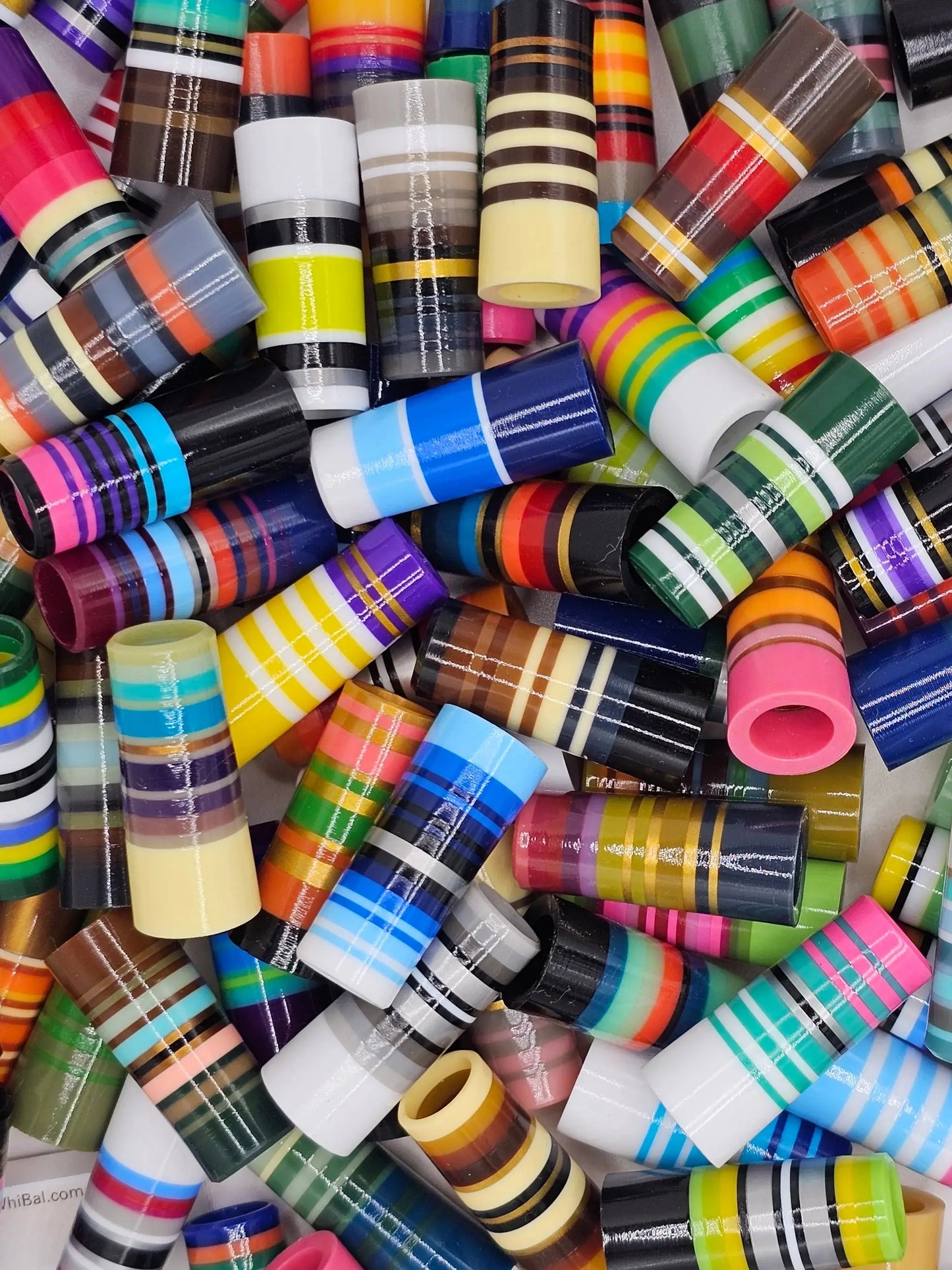 Roulette ferrules in assorted vibrant colors and stripe patterns for golf club customization, ideal for BBF golf accessories.